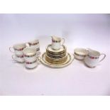 A PARAGON 'BELINDA' BONE CHINA PART TEA SERVICE comprising six cups, six saucers, milk jug, cream