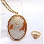 A SHELL CAMEO BROOCH circa 1885, marks worn; on a chain; with a small collection of costume