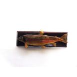 A TROUT mounted on a rectangular wooden plaque for wall hanging, plaque 56cm long