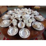 A WEDGWOOD 'HATHAWAY ROSE' BONE CHINA TEA & DINNER SERVICE comprising five tea cups and seven
