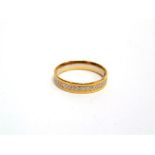 A 22 CARAT GOLD WEDDING RING 3.6g gross