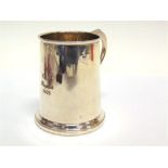 A SILVER MUG Sheffield 19__, of plain tapering form, inscribed, 195g (6.2 troy ozs) gross