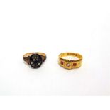 A LATE VICTORIAN MOURNING RING the oval head with a rose diamond forget me not to a blue enamel