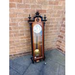 A CONTINENTAL WEIGHT-DRIVEN REGULATOR WALL CLOCK, the enamel dial with subsidiary seconds dial, in