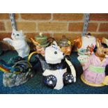 A GROUP OF TWELVE ASSORTED NOVELTY CHARACTER TEAPOTS including Royal Doulton, Beswick and Tony