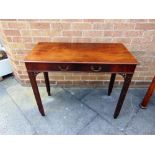 A CARVED MAHOGANY SIDE TABLE IN THE MANNER OF CHIPPENDALE, single drawer to frieze with cast