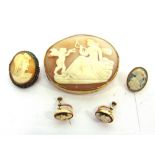 A VICTORIAN SHELL CAMEO BROOCH Cupid and Psyche; another cameo brooch; a pair of earrings; and a