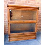 AN OAK GLOBE WERNICKE TWO TIER SECTIONAL BOOKCASE, 86cm wide 30.5cm deep 98cm high; together with