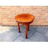 A VICTORIAN MAHOGANY WASHSTAND, the hinged top opening to circular basin (lacking liner), on three