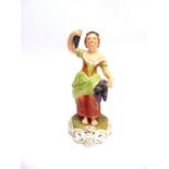 A ROYAL CROWN DERBY FIGURE of 'Autumn', modelled by M Mason, standing holding a vine, red printed