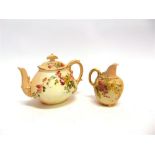 TWO ROYAL WORCESTER BLUSH IVORY ITEMS: a jug, shape number 1094, puce printed mark to base with date