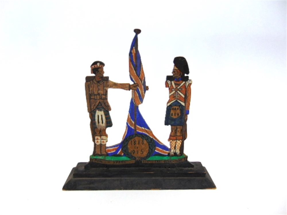 GREAT WAR - LORD ROBERTS MEMORIAL WORKSHOP - A WOODEN PAINTED CUT-OUT MODEL OF TWO HIGHLAND REGIMENT