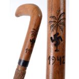 SECOND WORLD WAR - A RARE AFRIKA CORPS CARVED COMMEMORATIVE WALKING CANE decorated with a palm