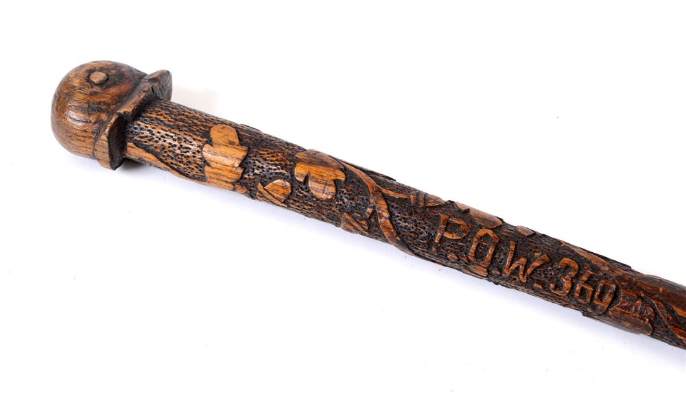 GREAT WAR - AN IMPERIAL GERMAN 'PRISONER OF WAR' CARVED WOODEN WALKING CANE decorated with oak leafs