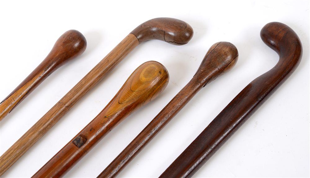 GREAT WAR AVIATION - A COLLECTION OF FIVE MAHOGANY WALKING CANES each worked from propellers, some