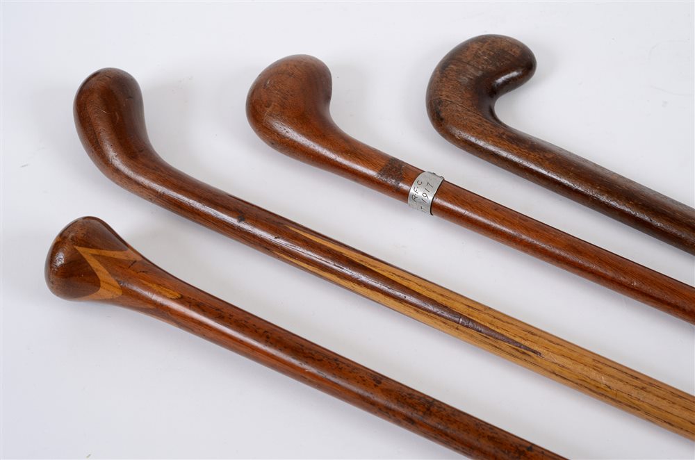 GREAT WAR AVIATION - A MAHOGANY WALKING CANE worked from a propeller with an applied aircraft