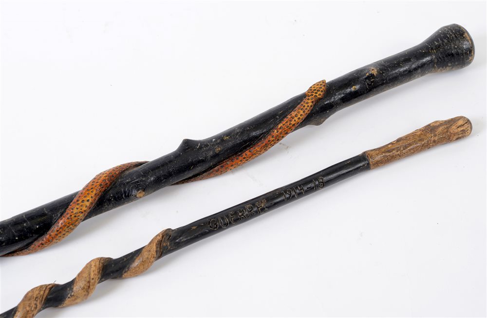 GREAT WAR - TWO TRADITIONAL FRENCH WALKING CANES each carved with twisting snakes, one inscribed '