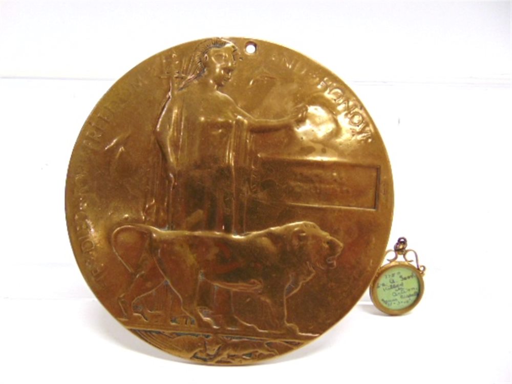 GREAT WAR - AN EMOTIVE BRITISH - INDIAN ARMY TRENCH ART SUSPENSION LOCKET modelled from a gilt brass