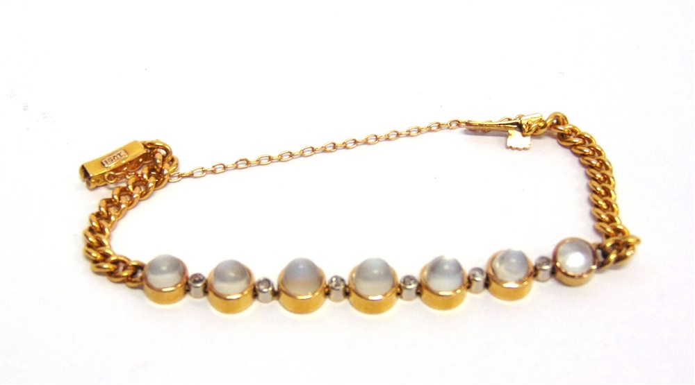 A DIAMOND AND MOONSTONE BRACELET tagged '15ct', the seven graduated steps cabochons with a rose