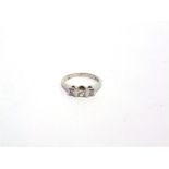 A THREE STONE PRINCESS CUT DIAMOND 18 CARAT WHITE GOLD RING of approximately 0.4 carats, and the