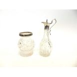 A VICTORIAN SILVER MOUNTED GLASS OIL JUG maker marks part worn, London 1853, the clear cut glass