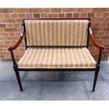 AN EDWARDIAN MAHOGANY SALON SOFA on square tapering supports, 99cm wide 54cm deep 89cm high