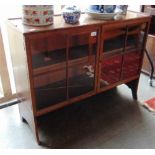 A SMALL MAHOGANY BOOKCASE with two astragal glazed doors, 93cm wide 28cm deep 70cm high
