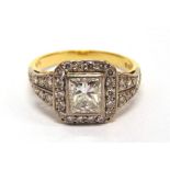 A PRINCESS CUT DIAMOND SET 18 CARAT GOLD RING the principal stone of approximately 0.8 carats,