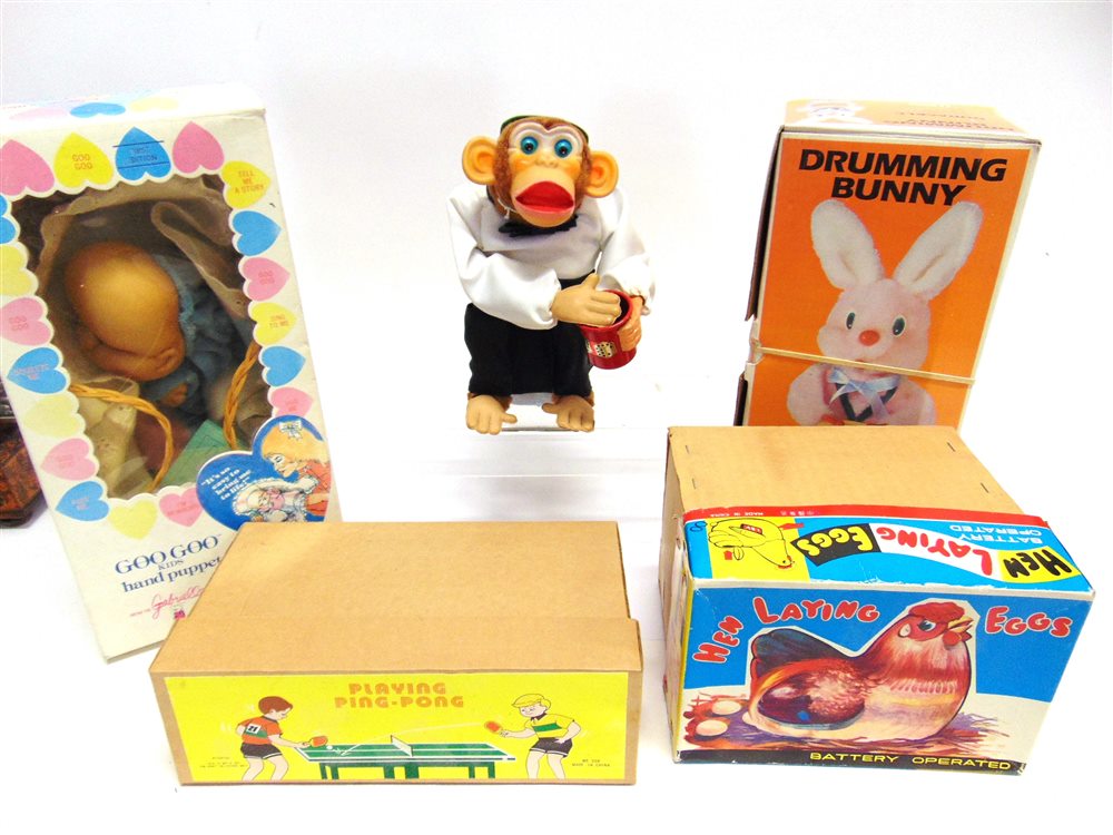 ASSORTED TOYS comprising a Japanese Cragstan battery-operated tinplate and plastic 'Crap Shooting