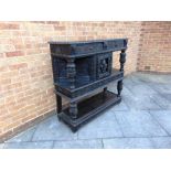 A CARVED AND EBONISED OAK SIDEBOARD, 127cm wide 44cm deep 123cm high