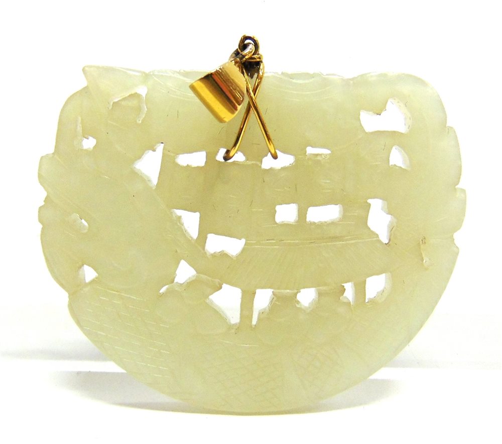 A CARVED JADE PENDANT carved as a dragon boat, of semi-circular form, 5.7cm long