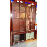 A LARGE VICTORIAN GLAZED MAHOGANY CABINET fitted with adjustable shelves, 154cm wide 39cm deep 236cm