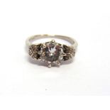 A DIAMOND RING the brilliant cut calculated as weighing approximately 1.54 carats, set between