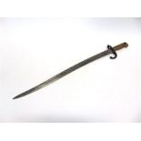 A FRENCH M1866 CHASSEPOT SWORD BAYONET the back edge engraved 'Mre d'Armes de St. Etienne Juin