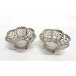 A PAIR OF SILVER BON BON DISHES Synyer & Beddloes, Birmingham 1911, of pierced hexafoil bowl