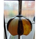 A LARGE LEADED AND STAINED GLASS CEILING LIGHT FITTING, with alternating panels of amber and brown