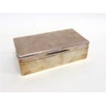 A SILVER CIGARETTE BOX maker P & B Ltd., London 1946, of plain rectangular form, 17.3cm long