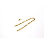 AN 18 CARAT GOLD BRACELET of fetter and three links, 20cm long, with a removed section, 10.8g gross