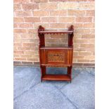 A VICTORIAN MAHOGANY WALL CABINET, the door with blind fret carved decoration dated 1887, 45cm