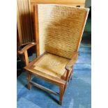 AN OAK FRAMED ORKNEY ARMCHAIR with woven rush back and string seat, 62cm wide 64cm deep 106cm high