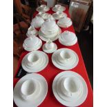 ROYAL DOULTON 'INNOCENCE/WISTFUL' DINNERWARE: a near complete service for eight, comprising eight