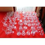 A MIXED COLLECTION OF GLASSWARE including custard cups, penny licks, eye glasses, measuring beakers,