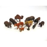 ELEVEN ELASTOLIN STYLE PLASTER COMPOSITION TOY ANIMALS including a hippopotamus, bison, camel,