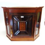 A MAHOGANY AND ROSEWOOD HANGING CORNER CABINET with marquetry inlaid decoration and bevelled glass