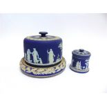 A VICTORIAN BLUE GROUND JASPERWARE CHEESE DISH AND COVER with sprigged decoration of a continuous