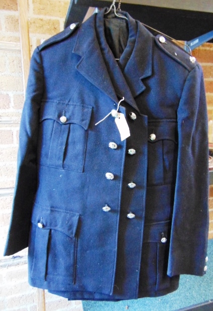 TWO FIREMAN'S TUNICS circa 1970s, by George Key of Rugeley (Staffordshire); together with a pair