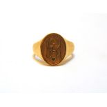 A CHINESE SIGNET RING stamped '22k' and with character marks, finger size T, 13g gross