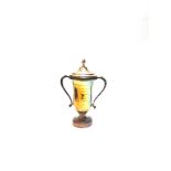 A SILVER TWO HANDLED TROPHY CUP inscribed, with an electroplated pull off cover; with a Victorian