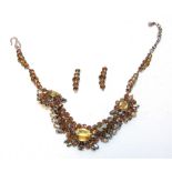 CHRISTIAN DIOR, A PASTE NECKLACE of brown and colourless pastes, dated 1958, 37cm long, plus two