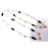 A SILVER AND MOSS AGATE CHAIN maker SRS, London 1977, of figure of eight and flat round links,